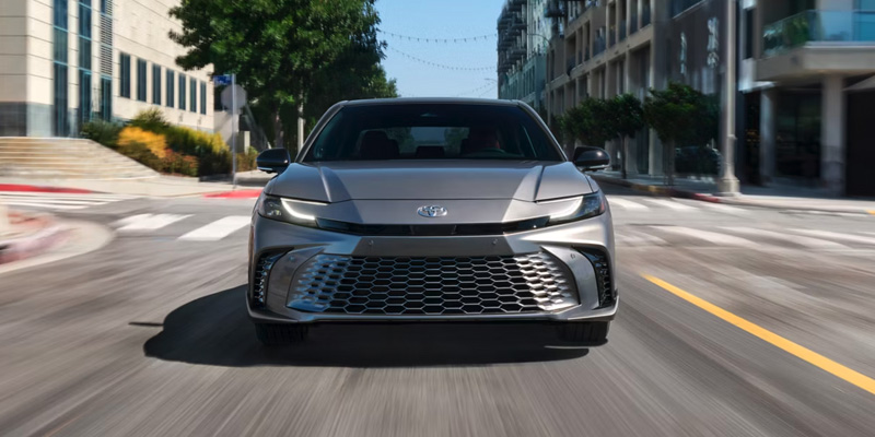 Grey 2026 Toyota Camry cruising in city