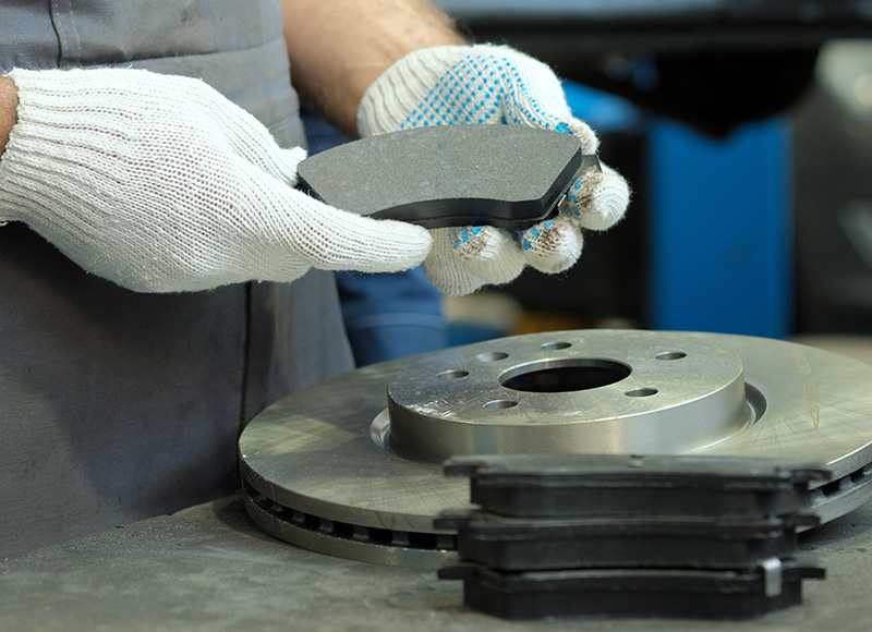 Person holding Brake pad