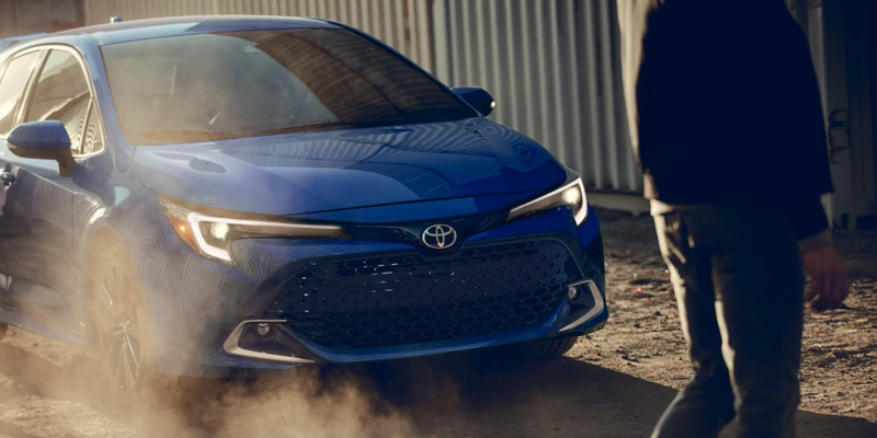 2026 Blue Toyota Corolla Hatchback stopped in it's front profile with front DRLs on